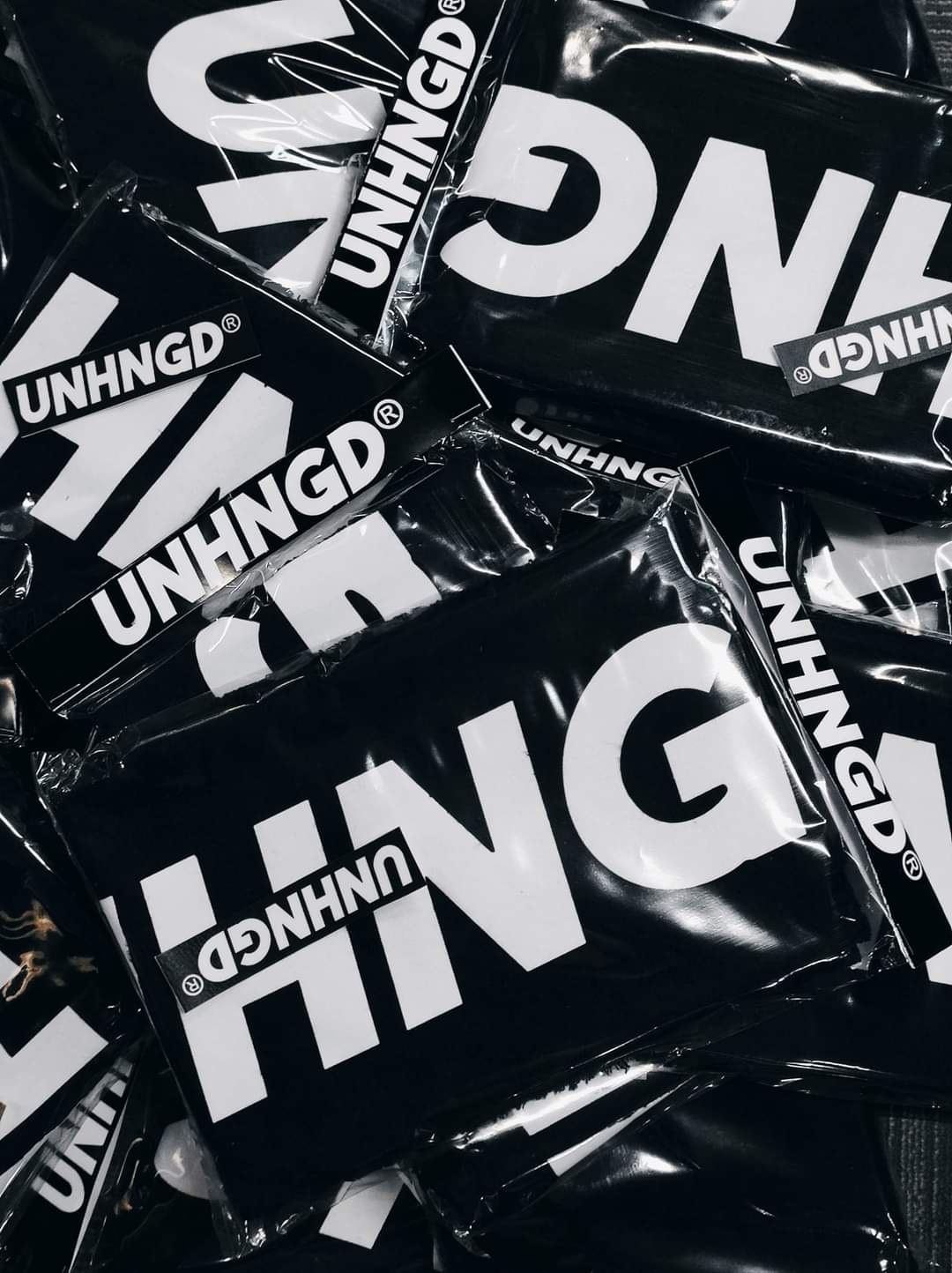 UNHNGD Towel — back